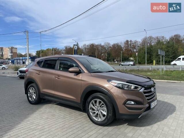 Коричневый Хендай Туксон, объемом двигателя 2 л и пробегом 115 тыс. км за 14200 $, фото 2 на Automoto.ua