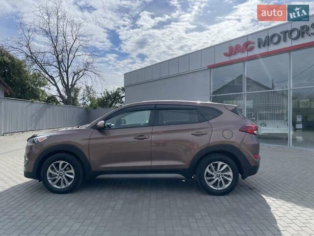 Коричневый Хендай Туксон, объемом двигателя 2 л и пробегом 115 тыс. км за 14200 $, фото 6 на Automoto.ua