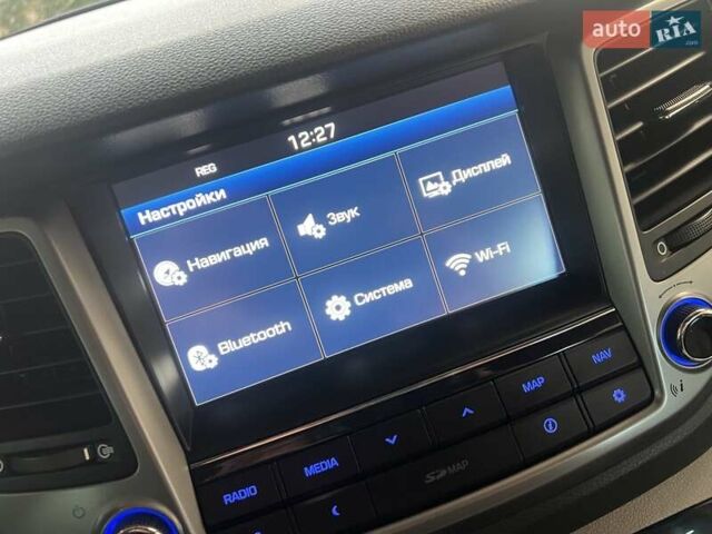 Коричневий Хендай Туксон, об'ємом двигуна 2 л та пробігом 108 тис. км за 18700 $, фото 36 на Automoto.ua