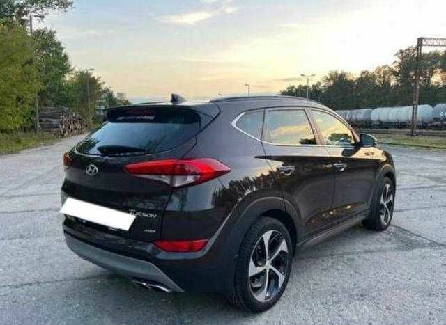 Коричневый Хендай Туксон, объемом двигателя 2 л и пробегом 140 тыс. км за 12100 $, фото 3 на Automoto.ua