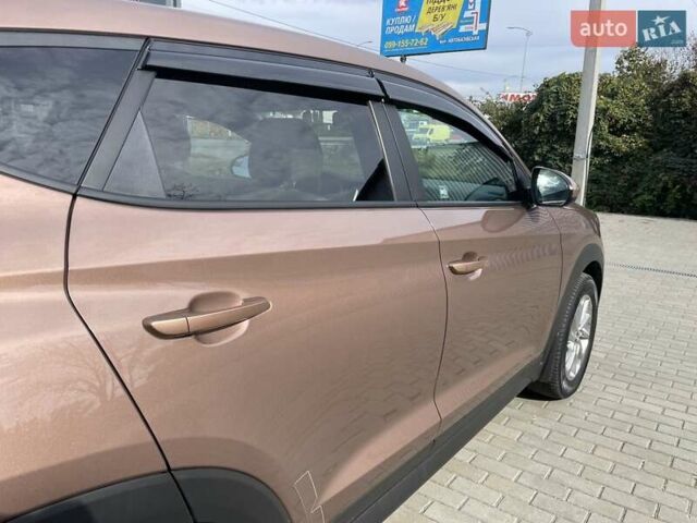 Коричневый Хендай Туксон, объемом двигателя 2 л и пробегом 115 тыс. км за 14200 $, фото 23 на Automoto.ua