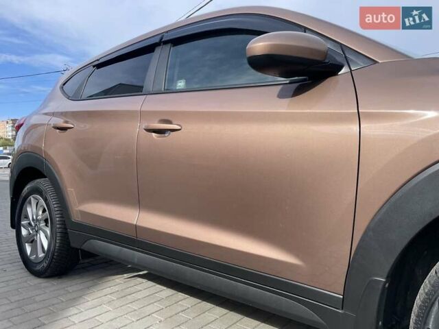 Коричневый Хендай Туксон, объемом двигателя 2 л и пробегом 115 тыс. км за 14200 $, фото 21 на Automoto.ua