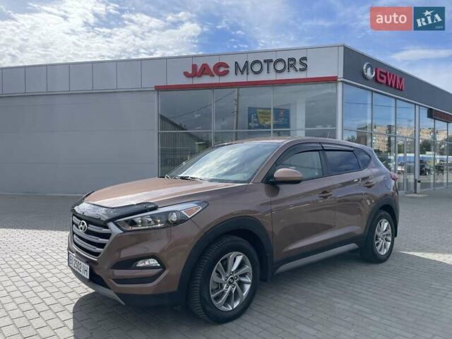Коричневый Хендай Туксон, объемом двигателя 2 л и пробегом 115 тыс. км за 14200 $, фото 14 на Automoto.ua