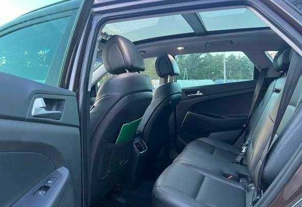 Коричневый Хендай Туксон, объемом двигателя 2 л и пробегом 140 тыс. км за 12100 $, фото 11 на Automoto.ua