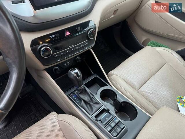 Коричневый Хендай Туксон, объемом двигателя 2 л и пробегом 115 тыс. км за 20990 $, фото 22 на Automoto.ua