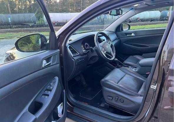 Коричневый Хендай Туксон, объемом двигателя 2 л и пробегом 140 тыс. км за 12100 $, фото 7 на Automoto.ua