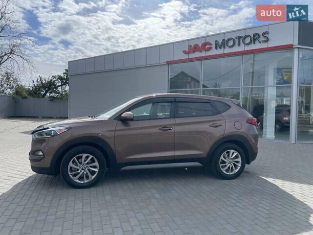 Коричневый Хендай Туксон, объемом двигателя 2 л и пробегом 115 тыс. км за 14200 $, фото 1 на Automoto.ua