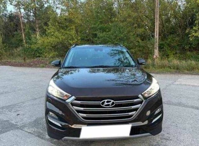 Коричневый Хендай Туксон, объемом двигателя 2 л и пробегом 140 тыс. км за 12100 $, фото 1 на Automoto.ua