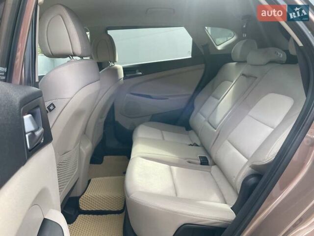 Коричневый Хендай Туксон, объемом двигателя 2 л и пробегом 115 тыс. км за 14200 $, фото 34 на Automoto.ua