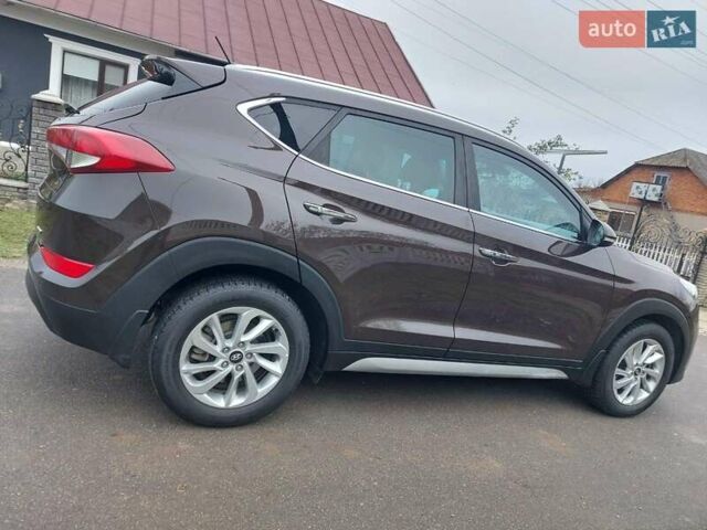 Коричневий Хендай Туксон, об'ємом двигуна 2 л та пробігом 87 тис. км за 19300 $, фото 7 на Automoto.ua