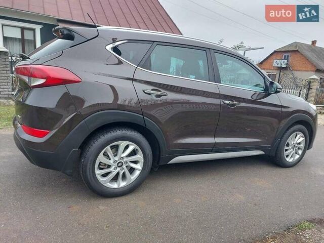 Коричневий Хендай Туксон, об'ємом двигуна 2 л та пробігом 87 тис. км за 19300 $, фото 11 на Automoto.ua
