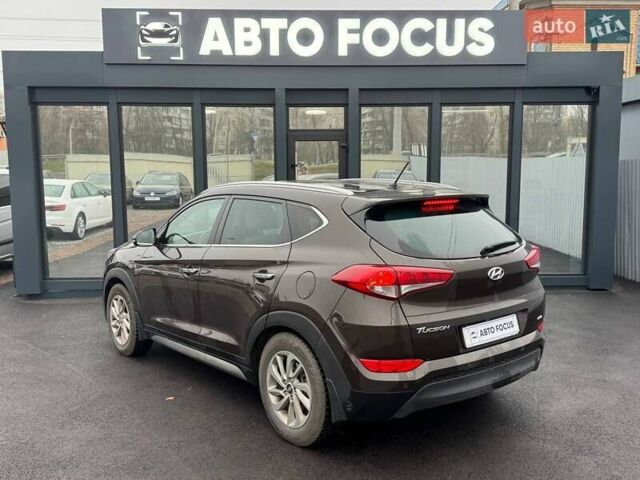 Коричневый Хендай Туксон, объемом двигателя 2 л и пробегом 115 тыс. км за 20990 $, фото 7 на Automoto.ua