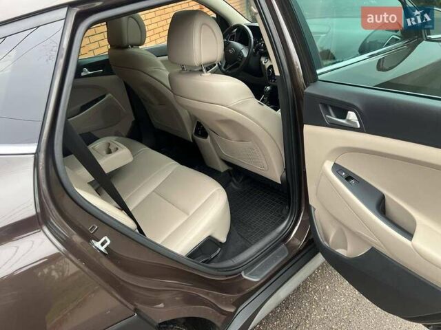 Коричневий Хендай Туксон, об'ємом двигуна 2 л та пробігом 108 тис. км за 18700 $, фото 43 на Automoto.ua