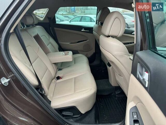 Коричневый Хендай Туксон, объемом двигателя 2 л и пробегом 115 тыс. км за 20990 $, фото 10 на Automoto.ua