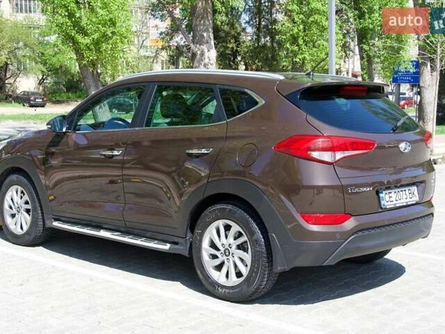 Коричневий Хендай Туксон, об'ємом двигуна 2 л та пробігом 95 тис. км за 19800 $, фото 4 на Automoto.ua
