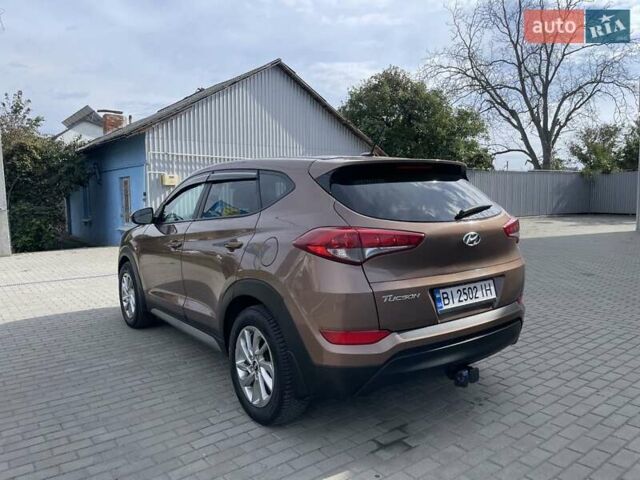 Коричневый Хендай Туксон, объемом двигателя 2 л и пробегом 115 тыс. км за 14200 $, фото 9 на Automoto.ua