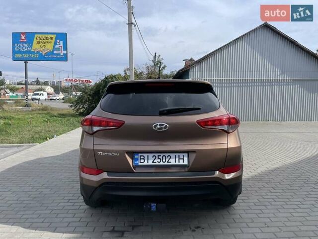 Коричневый Хендай Туксон, объемом двигателя 2 л и пробегом 115 тыс. км за 14200 $, фото 7 на Automoto.ua