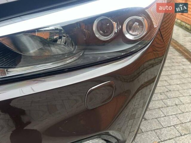 Коричневий Хендай Туксон, об'ємом двигуна 2 л та пробігом 108 тис. км за 18700 $, фото 7 на Automoto.ua