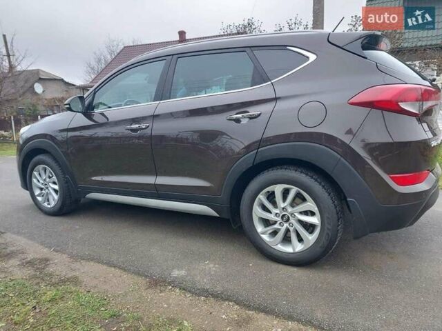Коричневий Хендай Туксон, об'ємом двигуна 2 л та пробігом 87 тис. км за 19300 $, фото 4 на Automoto.ua