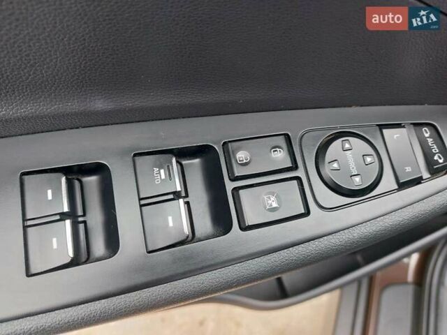 Коричневий Хендай Туксон, об'ємом двигуна 2 л та пробігом 87 тис. км за 19300 $, фото 31 на Automoto.ua