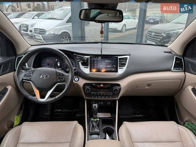 Коричневый Хендай Туксон, объемом двигателя 2 л и пробегом 115 тыс. км за 20990 $, фото 12 на Automoto.ua