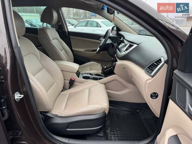 Коричневый Хендай Туксон, объемом двигателя 2 л и пробегом 115 тыс. км за 20990 $, фото 11 на Automoto.ua