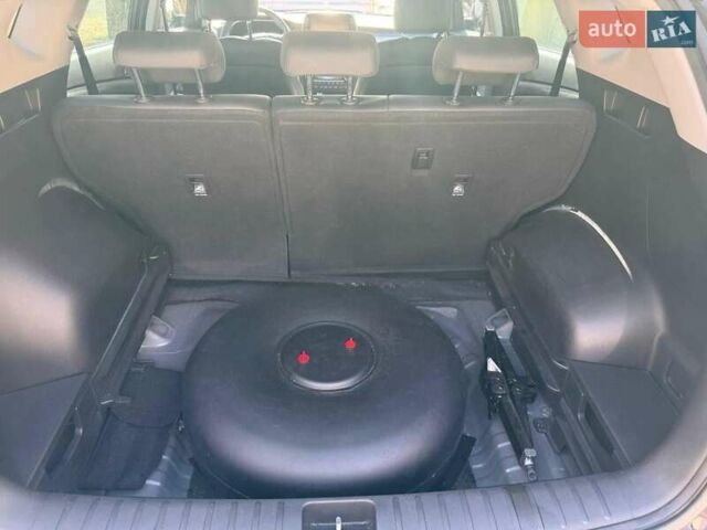 Коричневый Хендай Туксон, объемом двигателя 2 л и пробегом 98 тыс. км за 22000 $, фото 9 на Automoto.ua