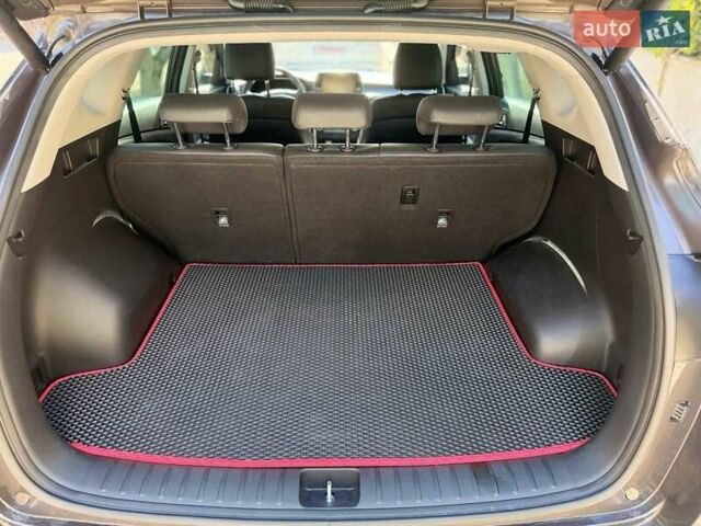 Коричневый Хендай Туксон, объемом двигателя 2 л и пробегом 98 тыс. км за 22000 $, фото 11 на Automoto.ua