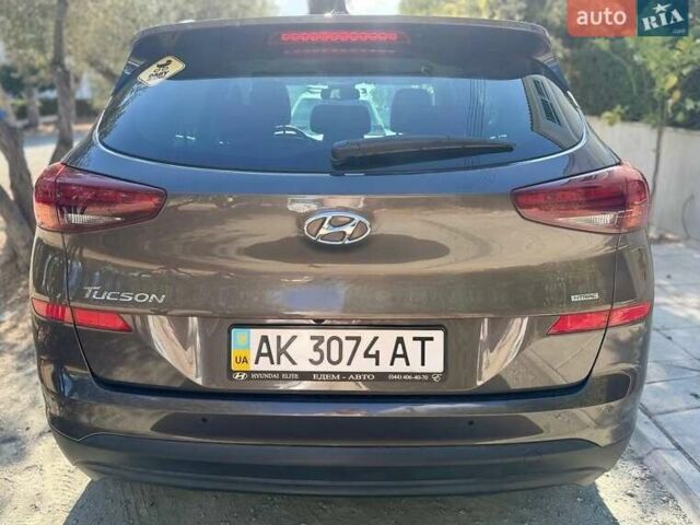 Коричневый Хендай Туксон, объемом двигателя 2 л и пробегом 98 тыс. км за 22000 $, фото 3 на Automoto.ua