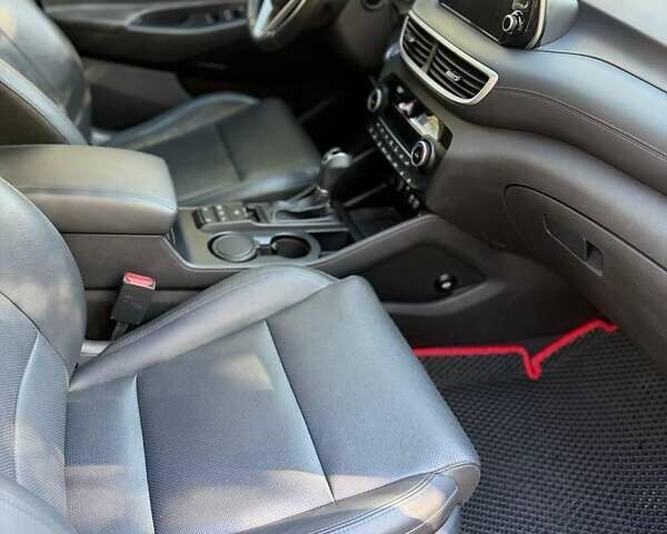 Коричневый Хендай Туксон, объемом двигателя 2 л и пробегом 98 тыс. км за 22000 $, фото 6 на Automoto.ua