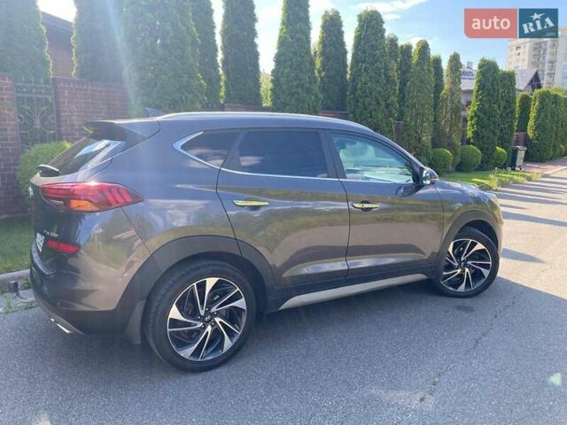 Коричневый Хендай Туксон, объемом двигателя 2 л и пробегом 93 тыс. км за 27750 $, фото 3 на Automoto.ua