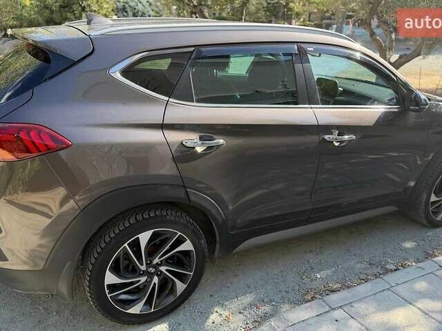 Коричневый Хендай Туксон, объемом двигателя 2 л и пробегом 98 тыс. км за 22000 $, фото 4 на Automoto.ua