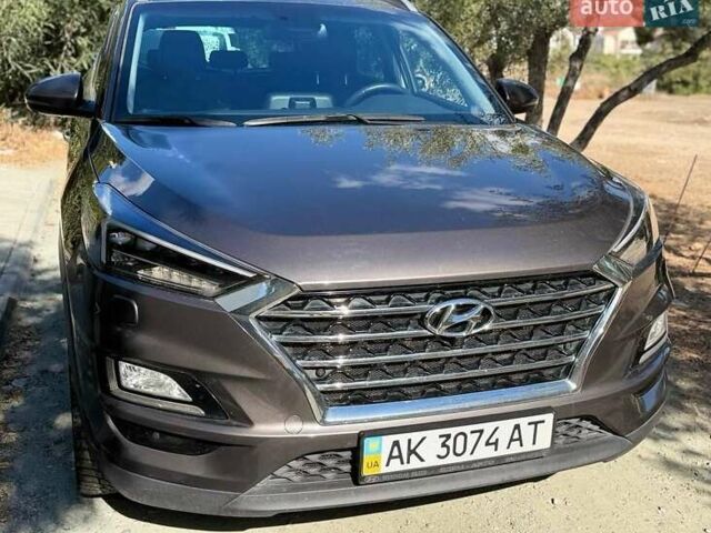 Коричневый Хендай Туксон, объемом двигателя 2 л и пробегом 98 тыс. км за 22000 $, фото 1 на Automoto.ua