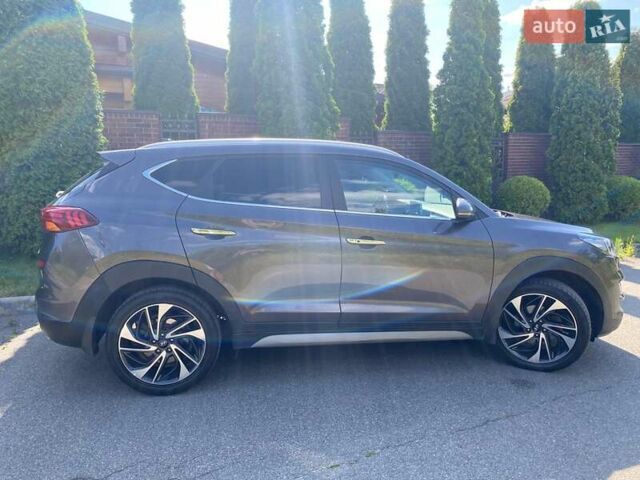 Коричневый Хендай Туксон, объемом двигателя 2 л и пробегом 93 тыс. км за 27750 $, фото 4 на Automoto.ua