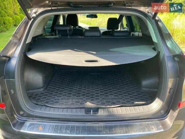 Коричневый Хендай Туксон, объемом двигателя 2 л и пробегом 93 тыс. км за 27750 $, фото 8 на Automoto.ua