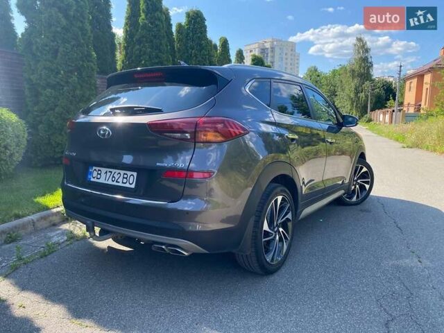 Коричневый Хендай Туксон, объемом двигателя 2 л и пробегом 93 тыс. км за 27750 $, фото 2 на Automoto.ua