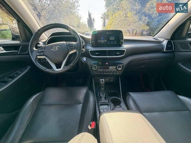 Коричневый Хендай Туксон, объемом двигателя 2 л и пробегом 98 тыс. км за 22000 $, фото 5 на Automoto.ua