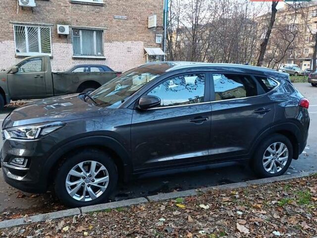 Коричневый Хендай Туксон, объемом двигателя 2 л и пробегом 132 тыс. км за 16500 $, фото 3 на Automoto.ua