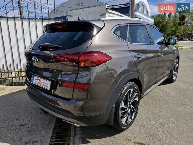 Коричневый Хендай Туксон, объемом двигателя 2 л и пробегом 127 тыс. км за 24999 $, фото 3 на Automoto.ua