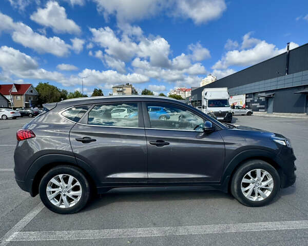 Коричневый Хендай Туксон, объемом двигателя 2 л и пробегом 99 тыс. км за 21000 $, фото 1 на Automoto.ua