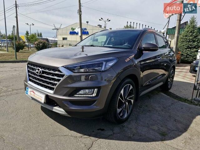 Коричневый Хендай Туксон, объемом двигателя 2 л и пробегом 127 тыс. км за 24999 $, фото 2 на Automoto.ua