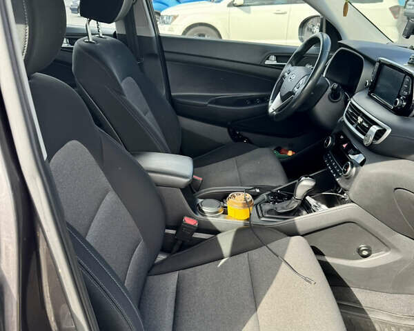 Коричневый Хендай Туксон, объемом двигателя 2 л и пробегом 99 тыс. км за 21000 $, фото 6 на Automoto.ua