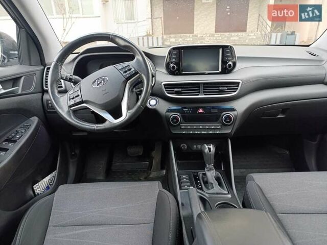 Коричневый Хендай Туксон, объемом двигателя 2 л и пробегом 132 тыс. км за 16500 $, фото 9 на Automoto.ua