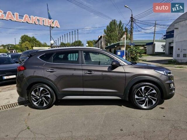 Коричневый Хендай Туксон, объемом двигателя 2 л и пробегом 127 тыс. км за 24999 $, фото 4 на Automoto.ua