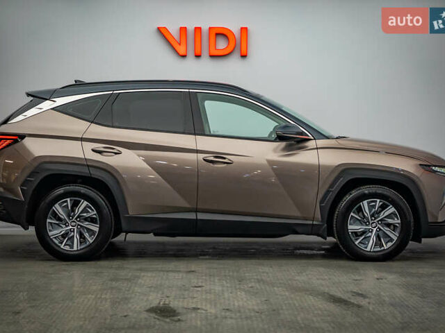 Коричневый Хендай Туксон, объемом двигателя 1.6 л и пробегом 55 тыс. км за 32877 $, фото 3 на Automoto.ua