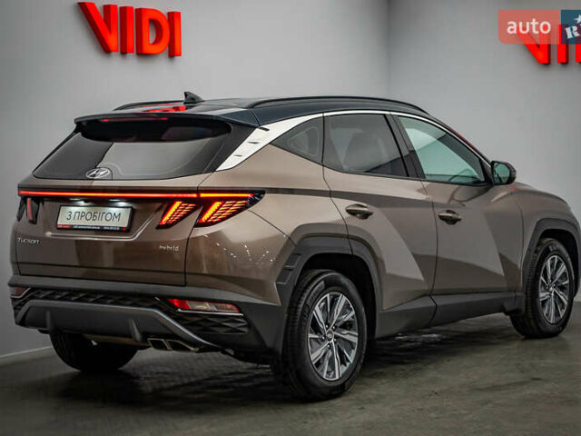 Коричневый Хендай Туксон, объемом двигателя 1.6 л и пробегом 55 тыс. км за 32877 $, фото 5 на Automoto.ua