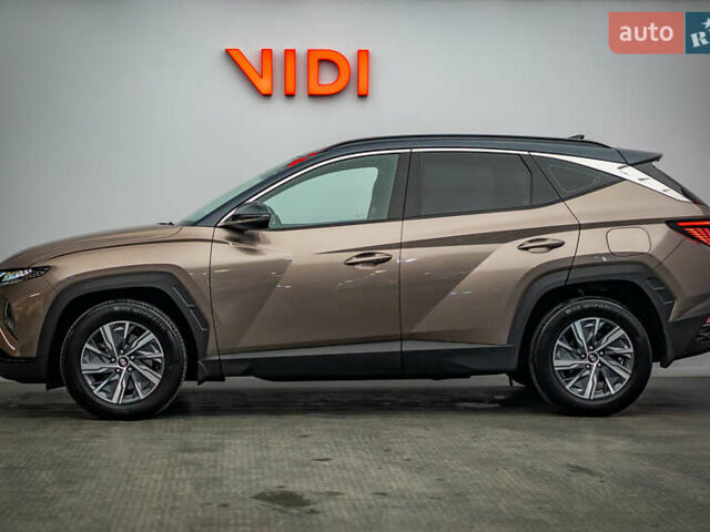 Коричневый Хендай Туксон, объемом двигателя 1.6 л и пробегом 55 тыс. км за 32877 $, фото 2 на Automoto.ua