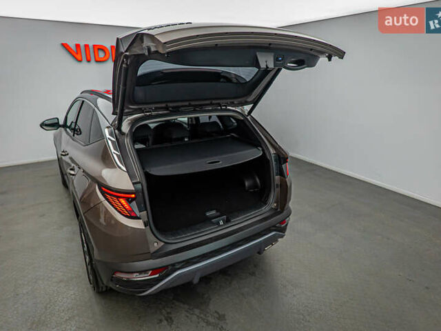 Коричневый Хендай Туксон, объемом двигателя 1.6 л и пробегом 55 тыс. км за 32877 $, фото 6 на Automoto.ua