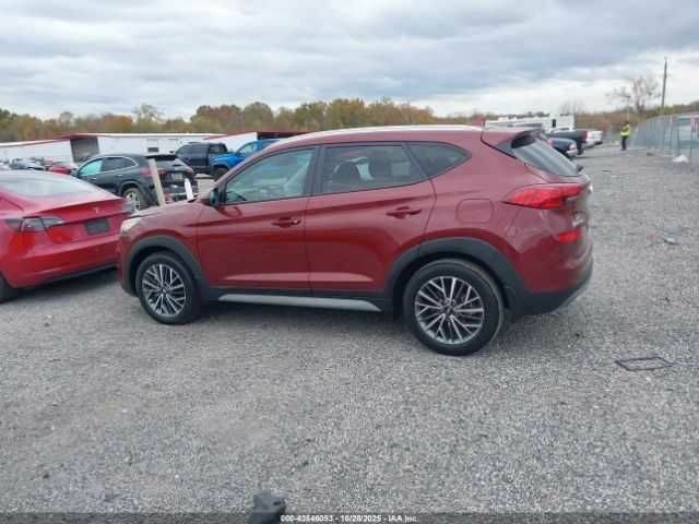 Красный Хендай Туксон, объемом двигателя 2.4 л и пробегом 12 тыс. км за 12000 $, фото 10 на Automoto.ua