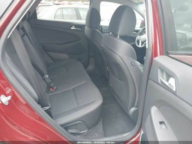 Красный Хендай Туксон, объемом двигателя 2.4 л и пробегом 12 тыс. км за 12000 $, фото 8 на Automoto.ua